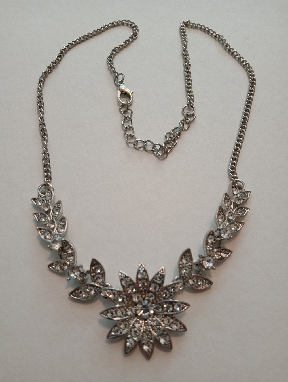 #1192.  Silver Toned, Clear Rhinestone Floral, Flower Design Necklace